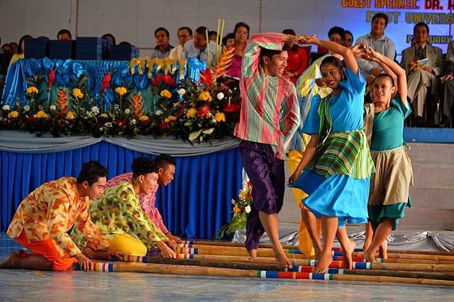 A group of people performing a danceDescription automatically generated