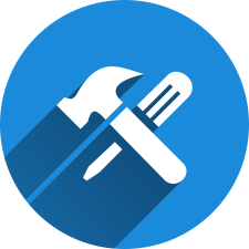 blue circle icon with a hammer and screwdriver crossed