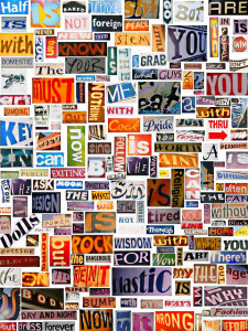 Color photo of words cut from magazine articles, posted on a wall. The colors and typefaces vary among words.