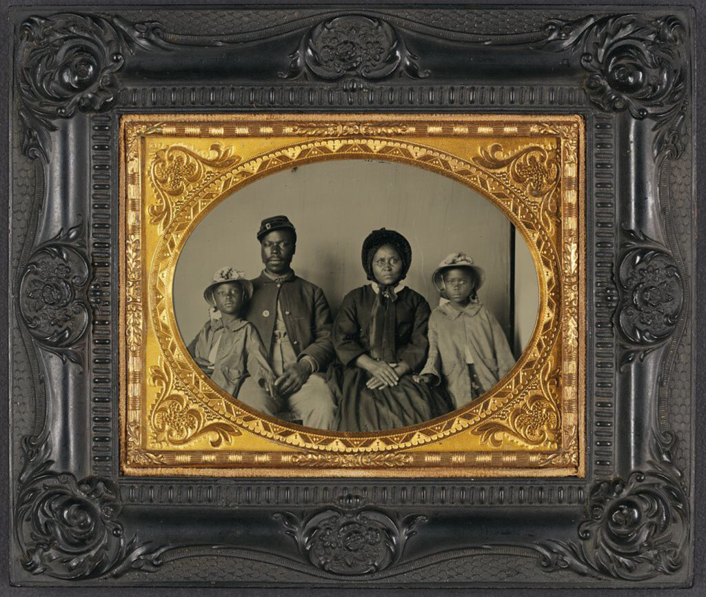 This African American family dressed in their finest clothes (including a USCT uniform) for this photograph, projecting respectability and dignity that was at odds with the southern perception of Black Americans. [Unidentified African American soldier in Union uniform with wife and two daughters], between 1863 and 1865. Library of Congress.