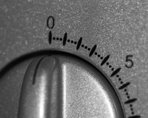 Close-up photo of a silver microwave dial timer