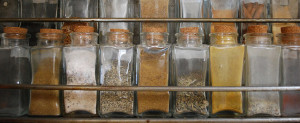 Photo of a row of unlabeled spice jars
