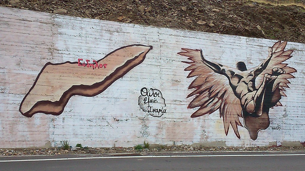 1024px-Ikaria_and_Ikarus_graffiti_at_Evdilos_Ikaria_island_-_Greece.jpg