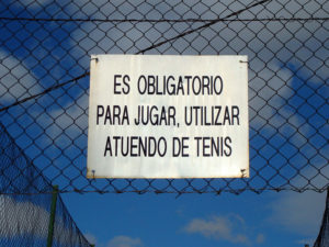 Sign on a tennis court
