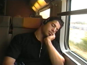 Man sleeping on train