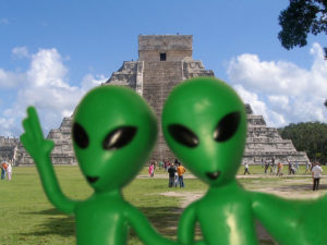 Extraterrestrials taking selfie in front of the Chichén Itzá pyramid