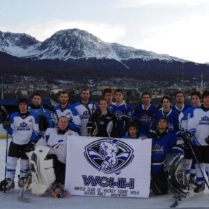 hockey team in front of some mountains