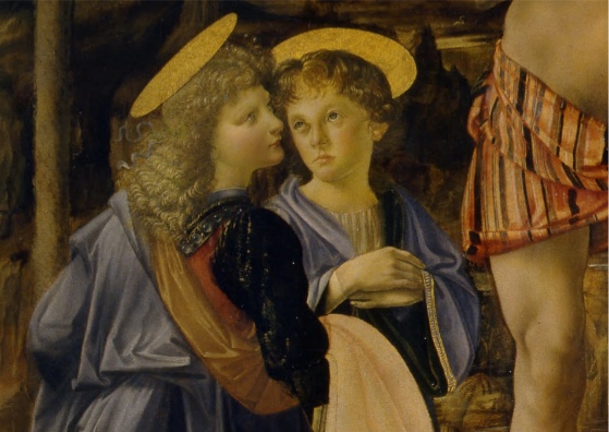 A close up of the two angel's faces to compare the artistic style