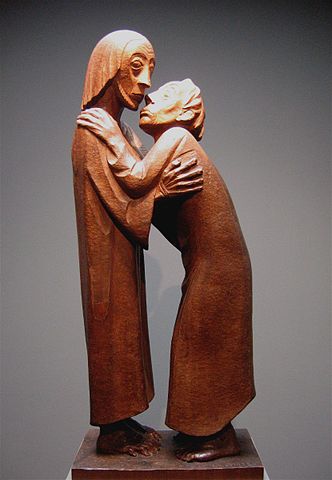 Two figures embracing. One looks to the side, while the other, whose head is positioned lower is looking up at him.