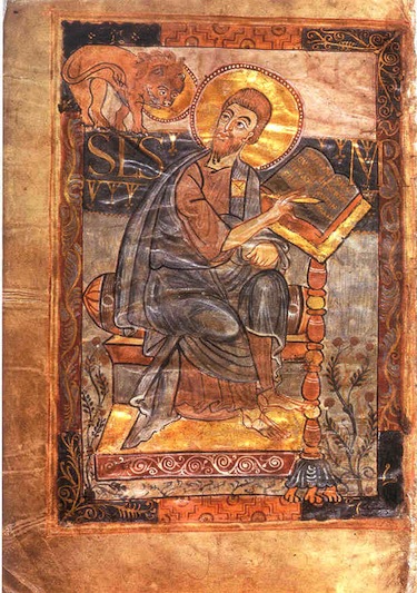 Saint Mark writing his gospel. A lion sits in the upper left corner of the page. Both Saint Mark and the lion have halos indicating divinity. The halos are gold leaf. The entire page has a warm-colored scheme.