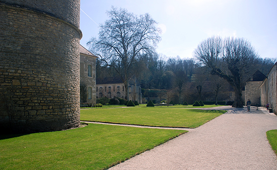 The grounds are well kept; there are lawns divided by smooth dirt and rock pathways.