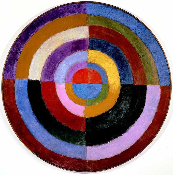 Abstract painting of circle resembling a target used for archery. The circle is dived into four equally sized segments painted in a variety of colors.