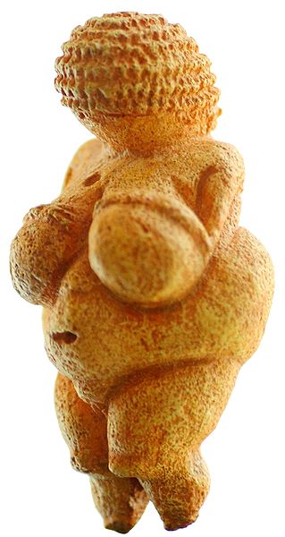 Statuette portrays a female figure estimated to have been made between about 28,000 and 25,000 BCE. It is carved from limestone and tinted with red ochre.