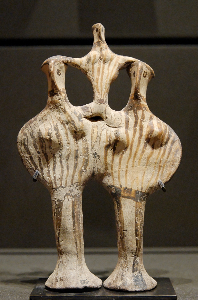 This is a color photograph of a Mycenaean phi figure. These figures are named for their shape, which resembles that of the Greek letters phi.