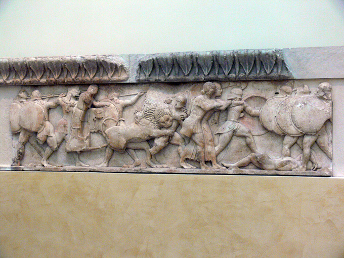 This is a photo of the north frieze of the Siphnian Treasury in Delphi, Greece. It depicts a struggle between the giants and gods.