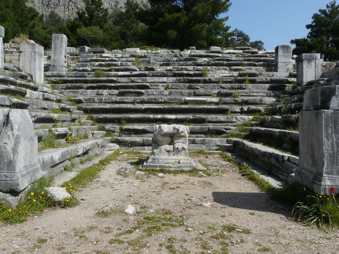 This is a current-day photo of a bouleuterion. It shows the ruins of the tiered seating arrangement common to this structure.