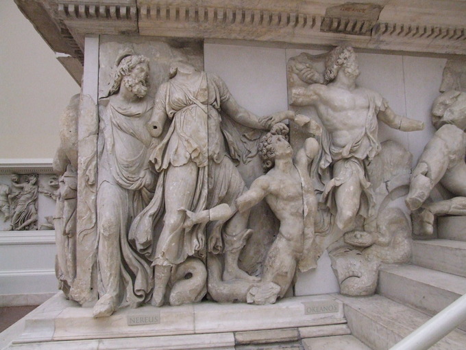 This is a photo of the relief of Nereus, Doris, a Giant, and Oceanus, the ocean gods gathered together.