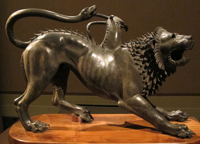 This is a photo of the Chimera of Arezzo. The bronze statue depicts a chimera—a mythological fire-breathing animal with a lion's head, a goat's body, and a serpent for a tail.