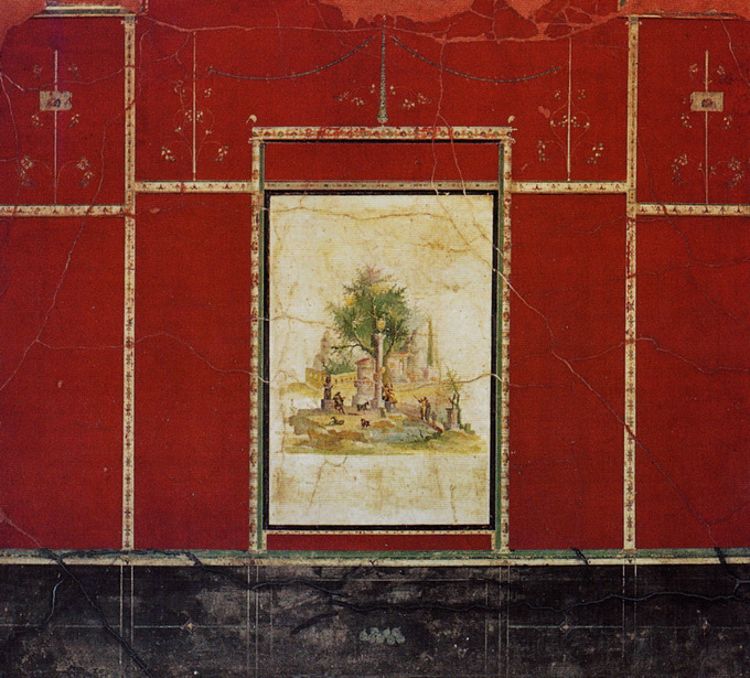 This photo shows a detail of a Third-Style wall painting. It demonstrates the technique of embracing the flat surface of the wall through the use of broad, monochromatic planes of color punctuated by intricately painted architectural details. In this case, the wall is red and details like a candelabra and faux moulding are painted in a lighter neutral color.