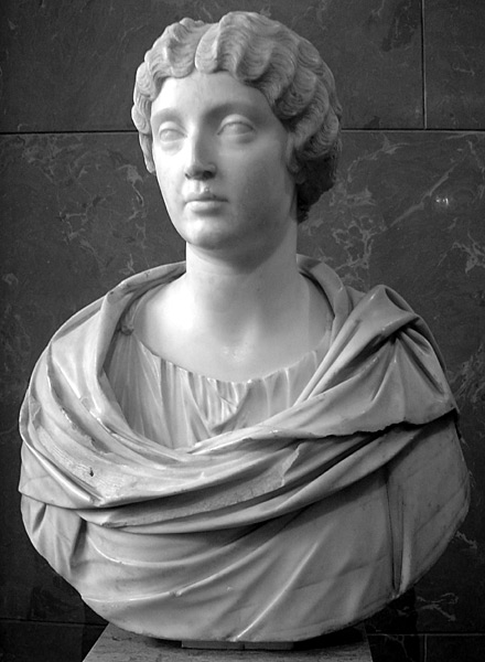 This photo shows a bust of Faustina the Younger, depicting hair parted in the middle and carefully crimped close to the head.