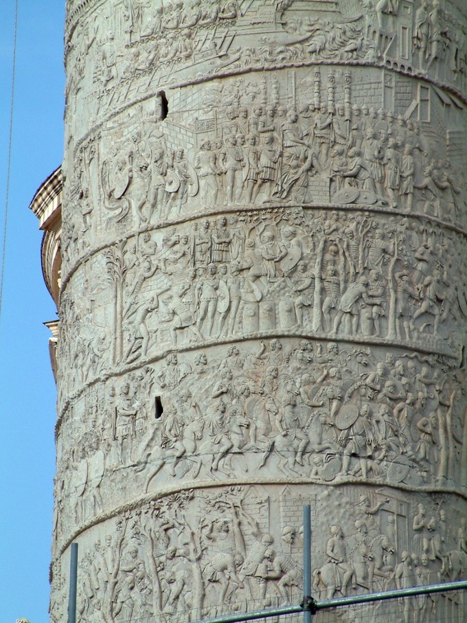 This is a closeup photo of five registers or bands from the Column of Trajan. Each band portrays scenes from Trajan's two victorious military campaigns against the Dacians.