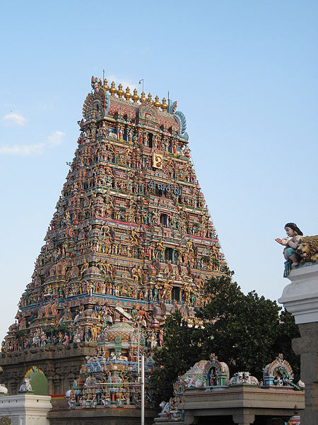 This photo shows the tower (gopuram) of the Kapaleeswarar Temple, a typical South Indian temple complex in Chennai, Tamil Nadu.