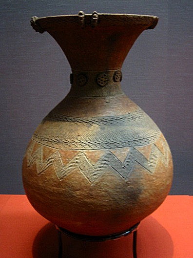 A jar with simple geometric patterns.