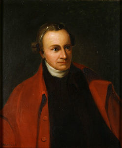 Oil painting of Patrick Henry. He wears glasses pushed on his forehead, a red coat, black clothing and a white collar