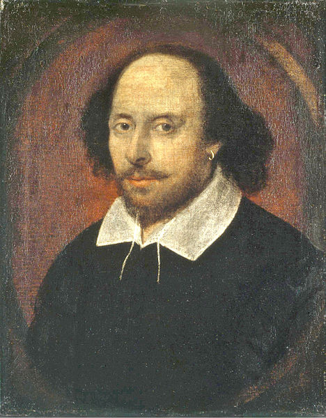 Oil painting of Shakespeare, balding on top and long brown hair over his ears, and a short beard. He wears a gold hoop earring, a black shirt with a white open collar.