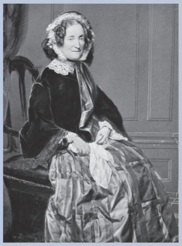 An older Lydia Howard Huntley Sigourney sitting forward on a chair hands in lap holding an embroidered hankerchief, black velvet jacket, silk dress