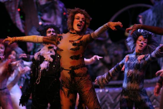 People singing and dancing in the musical, Cats