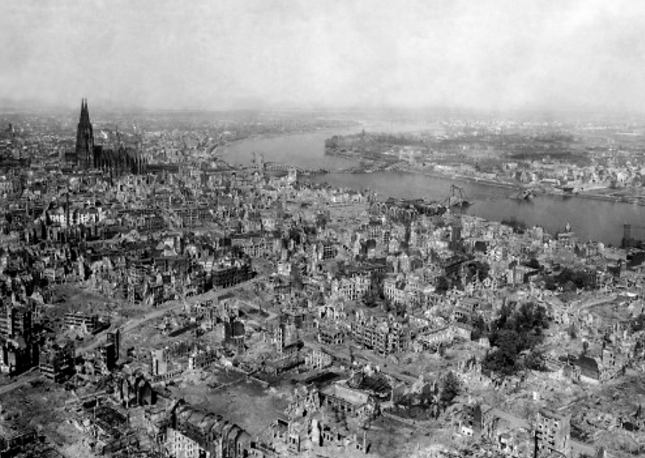 Bombings throughout Europe caused complete devastation in some areas, leveling beautiful ancient cities like Cologne, Germany. Cologne experienced an astonishing 262 separate air raids by Allied forces, leaving the city in ruins as in these the photograph above. Amazingly, the Cologne Cathedral stands nearly undamaged even after being hit numerous times, while the area around it crumbles. Photograph, April 24, 1945. Wikimedia, http://commons.wikimedia.org/wiki/File:Koeln_1945.jpg.