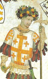Godefroy de Bouillon, and French Knight and Crusader. He is dressed in a white smock adorned with gold crosses, has flowers on his head, and his carrying a spear.