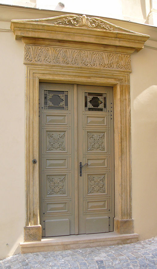 Figure 2. Classicist door in Olomouc, The Czech Republic. An example of Classicist architecture.