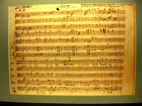 Figure 6. A facsimile sheet of music from the Dies Irae movement of the Requiem Mass in D minor (K. 626) in Mozart's own handwriting. It is located at the Mozarthaus in Vienna.
