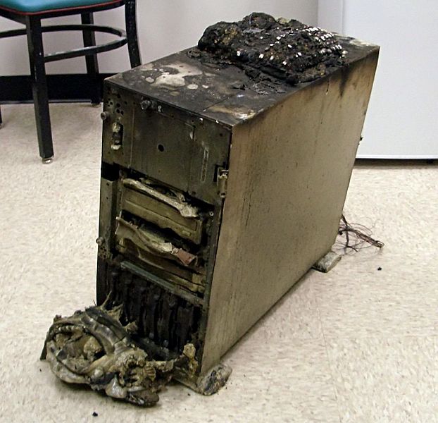 A computer server that was destroyed in the Choteau fire in NE Oklahoma. There’s a completely melted and nearly unrecognizable telephone on top.