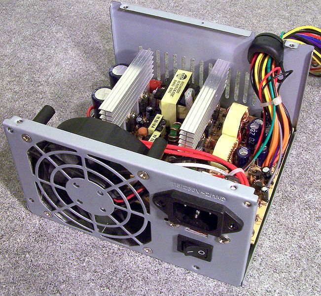 This is a Power Supply Unit, or PSU, for an ATA computer. The top cover has been removed to show the internals. As can be seen from the stamped input rating (2A at 115V or 1A at 230V is 230 W), this is a low-power supply. Assuming 75% efficiency, that's about 160W maximum output.
