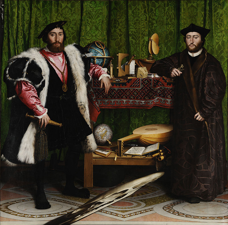 A painting. The subjects are two men in fine dress, whose elbows rest on a table laden with various objects of interest.
