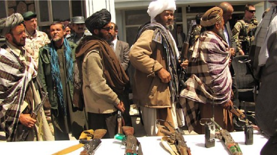 These former Taliban fighters surrendered their arms to the government of the Islamic Republic of Afghanistan during a reintegration ceremony at the provincial governor’s compound in May 2012. Wikimedia, http://commons.wikimedia.org/wiki/File:Former_Taliban_fighters_return_arms.jpg. 