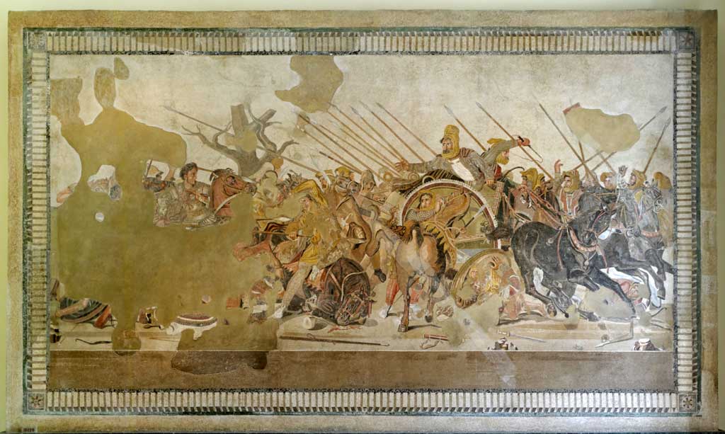 Mosaic of the Battle of Isus which depicts a dark-headed Alexander riding his brown horse Bucephalus, leading the charge against the retreating Persian king Darius.