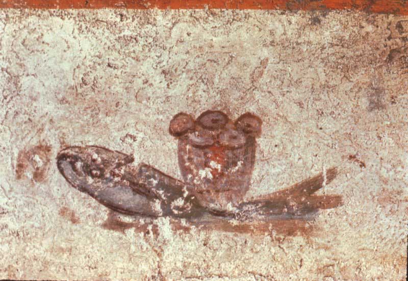 Fresco illustrating a grey-scale fish with loaves of bread a top it.