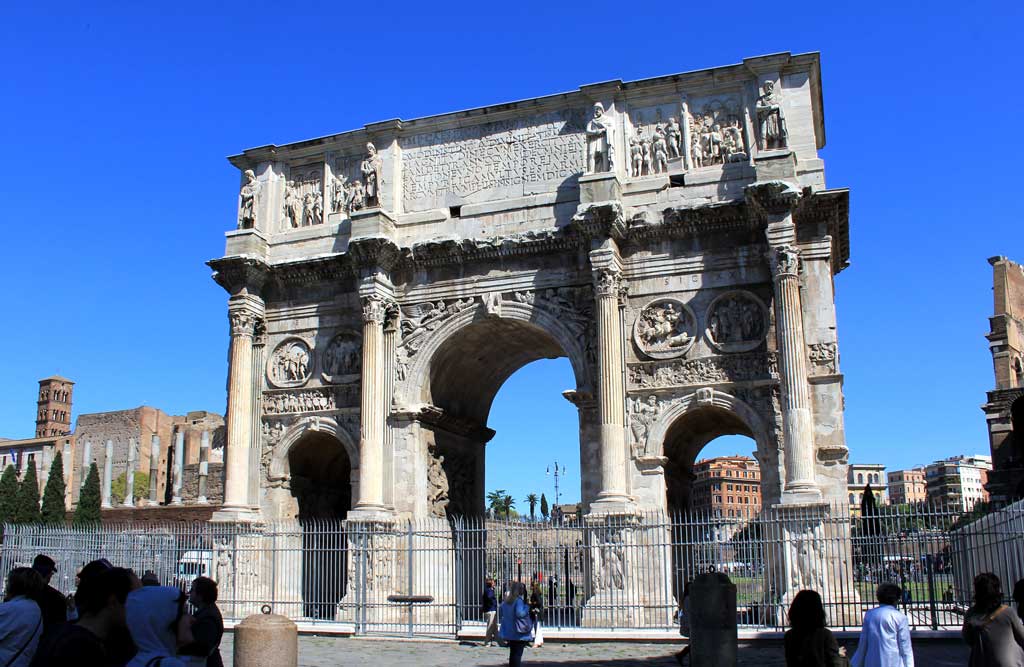 This is a current-day photo of the Arch of Constantine. Unlike Titus' arch, this arch includes three archways with the middle being the largest. Atop the archway in an inscription praising Constantine's rule as emperor.