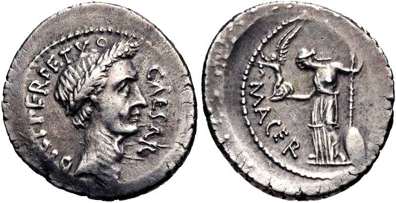 A portrait of Julius Caesar on a denarius. On the reverse side stands Venus Victix holding a winged Victory.
