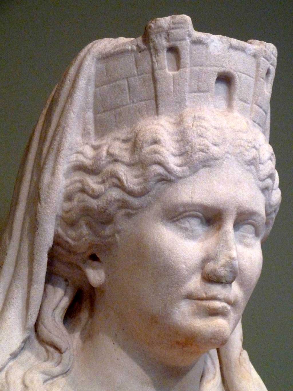 Cybele, the mother goddess, wears a crown in the form of a towered wall, a symbol of her role as protectress of cities, 50 CE, Roman, Getty Villa.