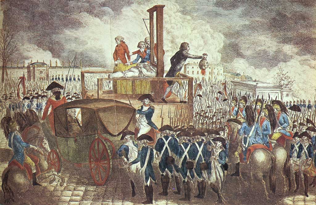 Men on a podium holding the head of Louis XVI with a crowd gathered around.
