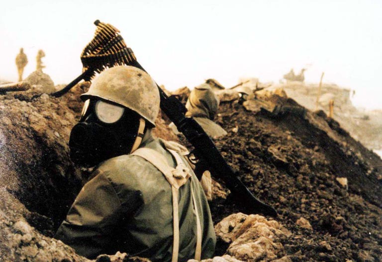 An Iranian soldier wearing a gas mask during the Iran–Iraq War.