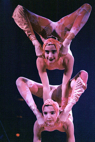 330px-Acrobats_at_Cirque_du_Soleils_Nouvelle_Experience_Finale_1994.jpg