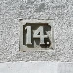 House number "14" carved in stone