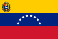 Flag of Venezuela: Yellow, Blue, Red, with an arc of stars in the middle and a crest in the upper left
