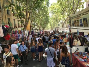 Crowds of shoppers at the Rastro market in Madrid
